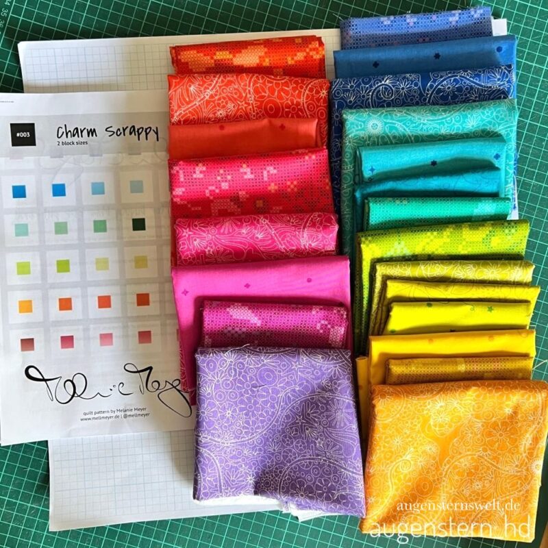 Featured Post Image - Quilt to Bee #4/23 – Mein Charm Scrappy Bee Quilt